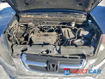 Zdjęcie 12 z 14 samochodu: 2002 HONDA CR-V LX VIN:JHLRD68412C016959 - miniatura
