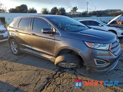 Czwarte zdjęcie samochodu z boku: 2017 FORD EDGE TITANIUM VIN:2FMPK3K94HBB98741 - miniatura