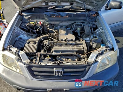 Zdjęcie 12 z 15 samochodu: 1999 HONDA CR-V LX VIN:JHLRD1847XC063777 - miniatura