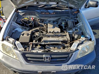 Zdjęcie 12 z 14 samochodu: 1999 HONDA CR-V LX VIN:JHLRD1847XC063777 - miniatura