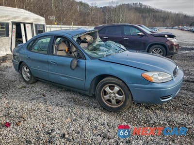 Czwarte zdjęcie samochodu z boku: 2005 FORD TAURUS SE VIN:1FAFP53215A199308 - miniatura