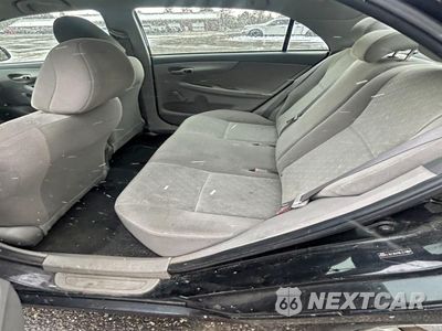 Piąte zdjęcie samochodu w środku: 2009 TOYOTA COROLLA BASE VIN:2T1BU40E29C130994 - miniatura