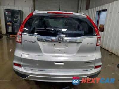 Zdjęcie 6 z 12 samochodu: 2016 HONDA CR-V TOURING VIN:5J6RM4H90GL125069 - miniatura