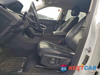 Zdjęcie 7 z 13 samochodu: 2021 LAND ROVER RANGE ROVER EVOQUE S VIN:SALZJ2FX5MH130277 - miniatura