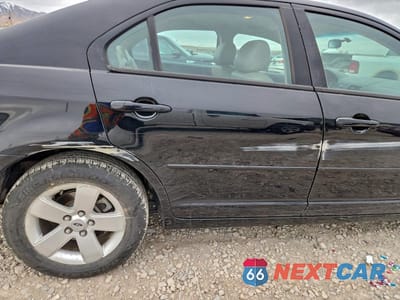 Zdjęcie 10 z 14 samochodu: 2006 FORD FUSION SE VIN:3FAFP07186R193680 - miniatura