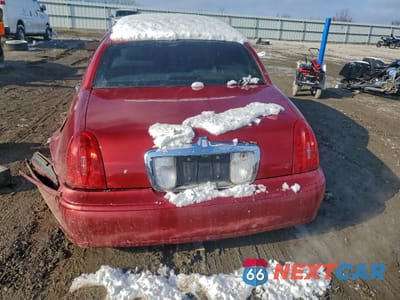 Zdjęcie 6 z 14 samochodu: 1999 LINCOLN TOWN CAR SIGNATURE VIN:1LNHM82W4XY701557 - miniatura