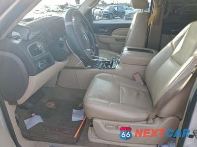 Zdjęcie 7 z 11 samochodu: 2013 GMC YUKON XL DENALI VIN:1GKS2MEF9DR336498 - miniatura