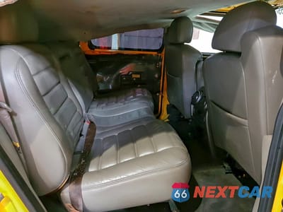 Zdjęcie 11 z 14 samochodu: 2003 HUMMER H2 VIN:5GRGN23UX3H144072 - miniatura