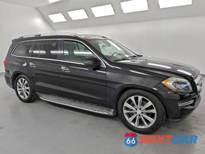 Czwarte zdjęcie samochodu z boku: 2014 MERCEDES-BENZ GL 450 4MATIC VIN:4JGDF7CE2EA379547 - miniatura