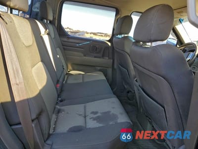 Zdjęcie 10 z 12 samochodu: 2006 HONDA RIDGELINE RTS VIN:2HJYK16486H502008 - miniatura