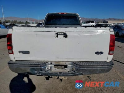 Zdjęcie 6 z 12 samochodu: 2000 FORD F150 VIN:1FTRX18W4YNB17399 - miniatura