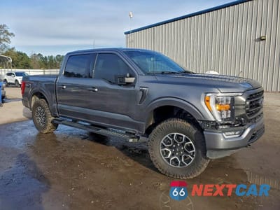 Czwarte zdjęcie samochodu z boku: 2023 FORD F150 SUPERCREW VIN:1FTFW1E53PFB57015 - miniatura