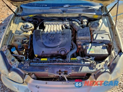 Zdjęcie 11 z 14 samochodu: 2003 HYUNDAI SONATA GLS VIN:KMHWF35H23A873767 - miniatura