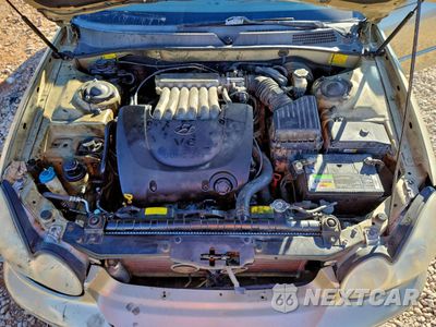 Zdjęcie 11 z 14 samochodu: 2003 HYUNDAI SONATA GLS VIN:KMHWF35H23A873767 - miniatura