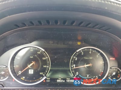 Zdjęcie 9 z 12 samochodu: 2015 BMW 750 LI VIN:WBAYE8C55FD782076 - miniatura