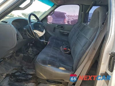 Zdjęcie 7 z 12 samochodu: 2000 FORD F150 VIN:1FTRX18W4YNB17399 - miniatura