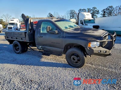 Czwarte zdjęcie samochodu z boku: 2003 DODGE RAM 3500 FLATBED TRUCK VIN:3D7MA46C43G785507 - miniatura