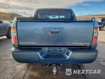 Zdjęcie 6 z 12 samochodu: 2007 HONDA RIDGELINE RTX VIN:2HJYK16307H537022 - miniatura