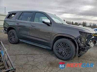 Czwarte zdjęcie samochodu z boku: 2021 CHEVROLET TAHOE K1500 PREMIER VIN:1GNSKSKD9MR350637 - miniatura