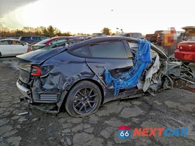 Trzecie zdjęcie samochodu z tyłu: 2022 TESLA MODEL 3 VIN:5YJ3E1EB7NF127173 - miniatura