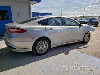 Trzecie zdjęcie samochodu z tyłu: 2013 FORD FUSION SE HYBRID VIN:3FA6P0LU0DR206838 - miniatura