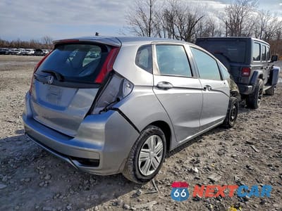Trzecie zdjęcie samochodu z tyłu: 2020 HONDA FIT LX VIN:3HGGK5H46LM702582 - miniatura