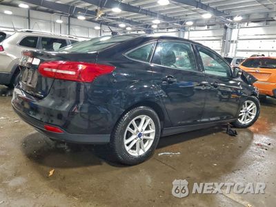 Trzecie zdjęcie samochodu z tyłu: 2016 FORD FOCUS SE VIN:1FADP3F26GL391628 - miniatura