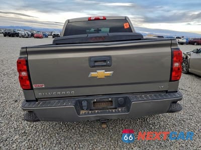 Zdjęcie 6 z 12 samochodu: 2017 CHEVROLET SILVERADO K1500 LT VIN:3GCUKREH0HG350962 - miniatura