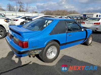 Trzecie zdjęcie samochodu z tyłu: 1987 FORD MUSTANG GT VIN:1FABP42E9HF129101 - miniatura