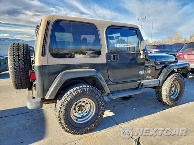 Trzecie zdjęcie samochodu z tyłu: 1999 JEEP WRANGLER / TJ SAHARA VIN:1J4FY49S8XP485157 - miniatura