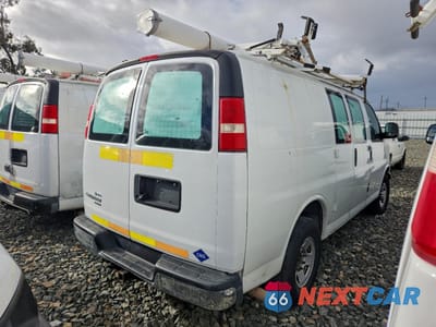 Trzecie zdjęcie samochodu z tyłu: 2014 CHEVROLET EXPRESS G2500 VIN:1GCWGFCB4E1122884 - miniatura