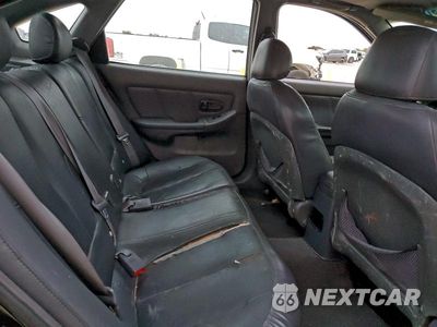 Zdjęcie 10 z 11 samochodu: 2002 HYUNDAI ELANTRA VIN:KMHDN55D92U057946 - miniatura