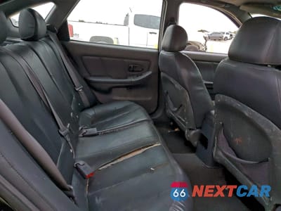 Zdjęcie 10 z 13 samochodu: 2002 HYUNDAI ELANTRA VIN:KMHDN55D92U057946 - miniatura