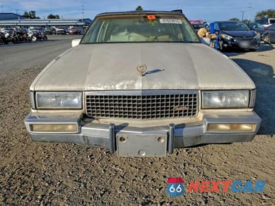 Piąte zdjęcie samochodu w środku: 1989 CADILLAC DEVILLE VIN:1G6CD5150K4314433 - miniatura