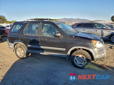 Czwarte zdjęcie samochodu z boku: 2004 HONDA CR-V LX VIN:JHLRD68404C023999 - miniatura