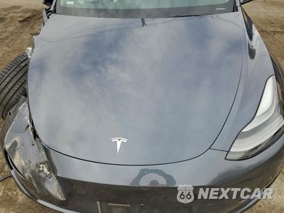Zdjęcie 11 z 12 samochodu: 2022 TESLA MODEL Y VIN:7SAYGDEF5NF564967 - miniatura