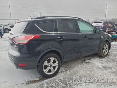 Trzecie zdjęcie samochodu z tyłu: 2016 FORD ESCAPE SE VIN:1FMCU9G97GUB17356 - miniatura