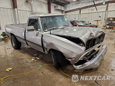 Czwarte zdjęcie samochodu z boku: 1991 DODGE D-SERIES D150 VIN:1B7HE16Y9MS349756 - miniatura