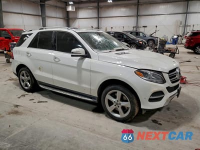 Czwarte zdjęcie samochodu z boku: 2019 MERCEDES-BENZ GLE 400 4MATIC VIN:4JGDA5GBXKB210174 - miniatura