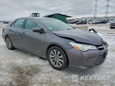 Czwarte zdjęcie samochodu z boku: 2016 TOYOTA CAMRY HYBRID VIN:4T1BD1FK7GU181334 - miniatura
