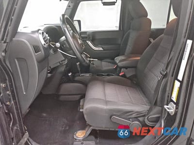 Zdjęcie 7 z 13 samochodu: 2012 JEEP WRANGLER UNLIMITED SAHARA VIN:1C4HJWEG7CL113939 - miniatura