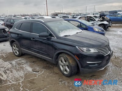 Czwarte zdjęcie samochodu z boku: 2018 LINCOLN MKC PREMIERE VIN:5LMCJ1D94JUL01303 - miniatura