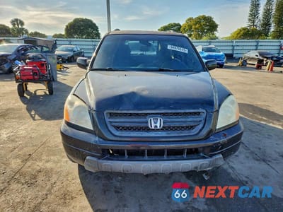 Piąte zdjęcie samochodu w środku: 2005 HONDA PILOT EXL VIN:5FNYF18615B031878 - miniatura