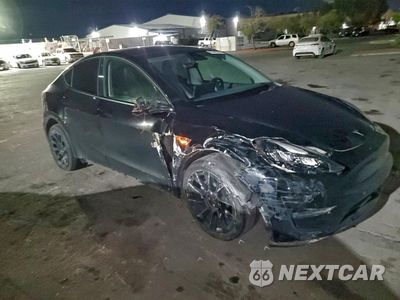 Czwarte zdjęcie samochodu z boku: 2022 TESLA MODEL Y VIN:7SAYGDEE1NF341879 - miniatura