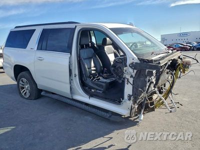 Czwarte zdjęcie samochodu z boku: 2019 CHEVROLET SUBURBAN K1500 LT VIN:1GNSKHKC2KR109770 - miniatura