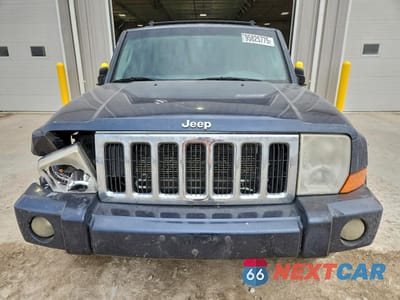 Piąte zdjęcie samochodu w środku: 2010 JEEP COMMANDER SPORT VIN:1J4RG4GK5AC125443 - miniatura