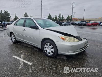 Czwarte zdjęcie samochodu z boku: 2003 TOYOTA CAMRY LE VIN:4T1BE32K33U750446 - miniatura