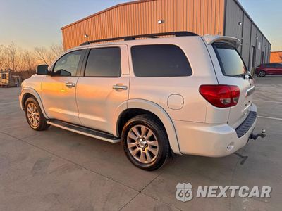 Trzecie zdjęcie samochodu z tyłu: 2014 TOYOTA SEQUOIA PLATINUM VIN:5TDYY5G14ES055210 - miniatura