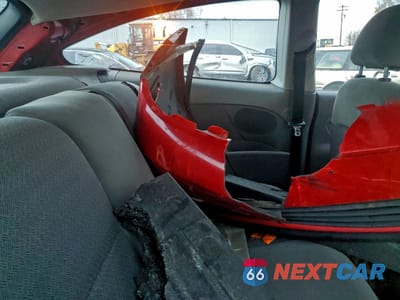Zdjęcie 10 z 13 samochodu: 2000 FORD FOCUS ZX3 VIN:3FAFP3132YR173357 - miniatura