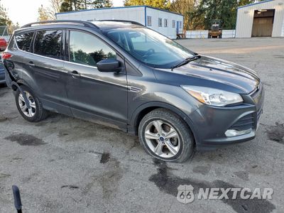 Czwarte zdjęcie samochodu z boku: 2016 FORD ESCAPE SE VIN:1FMCU0GX2GUA85328 - miniatura